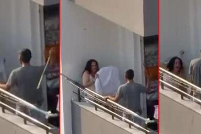 Adana'da vahşet! Tartıştığı kadını balkonda sopayla dövdü